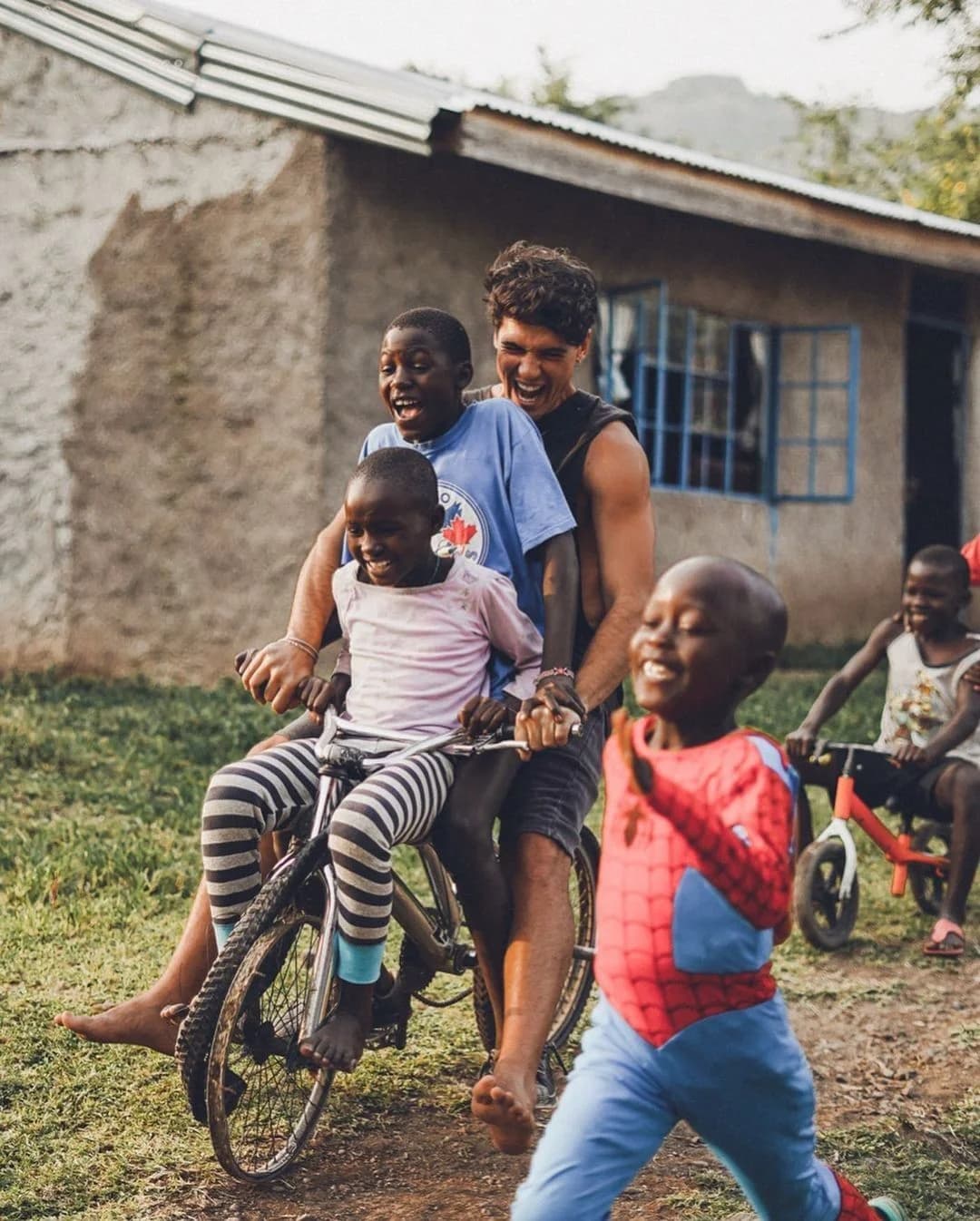Children playing near a building